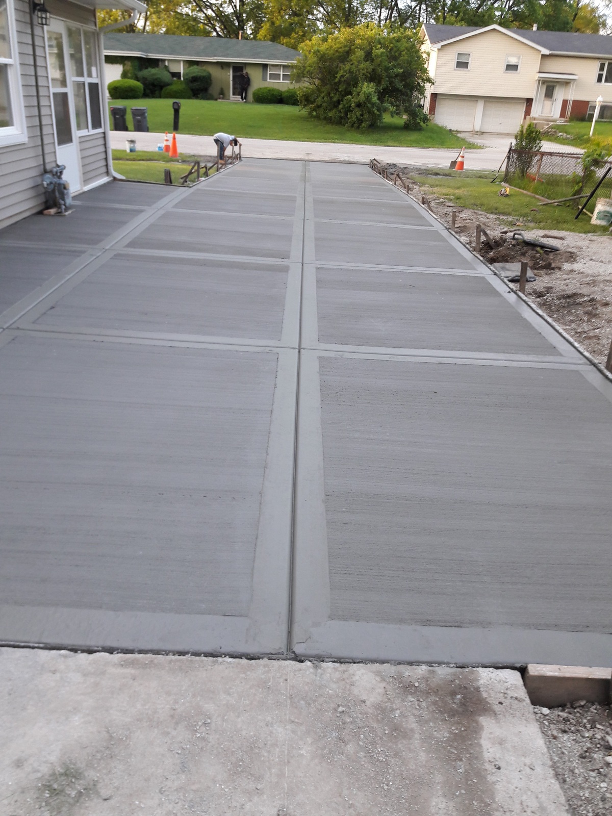 Concrete walkway beside a home